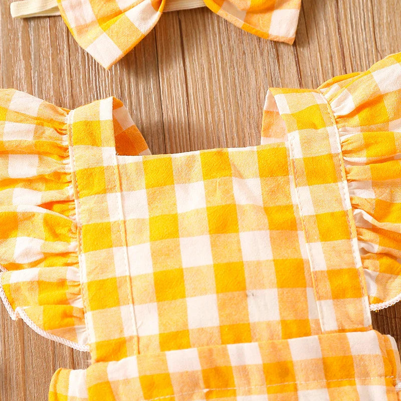 Bambino's Checkered Romper And Bow Set