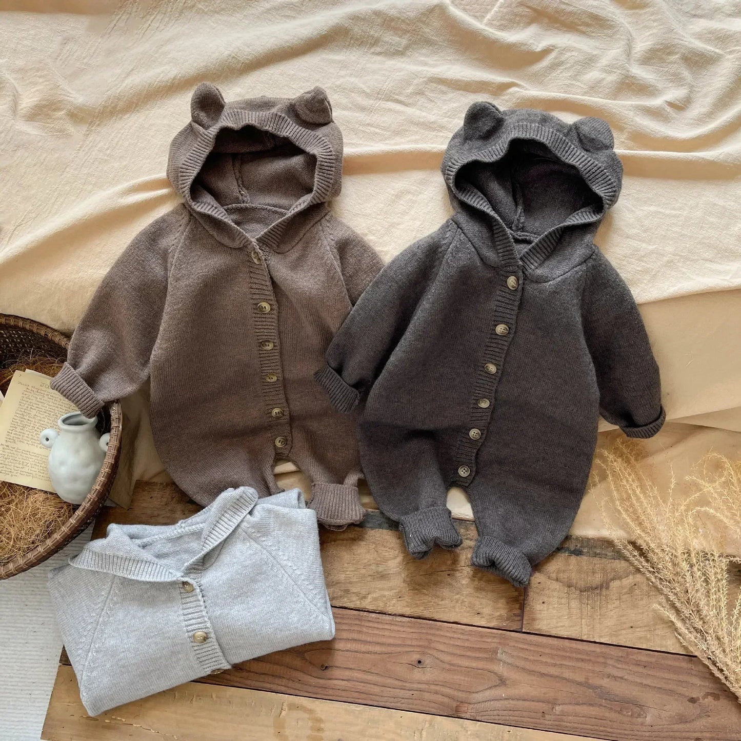 Bambino's Knitted Button Onesie