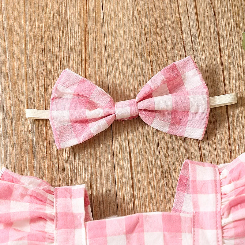 Bambino's Checkered Romper And Bow Set