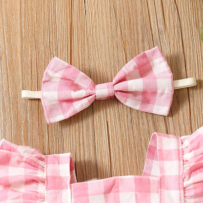 Bambino's Checkered Romper And Bow Set