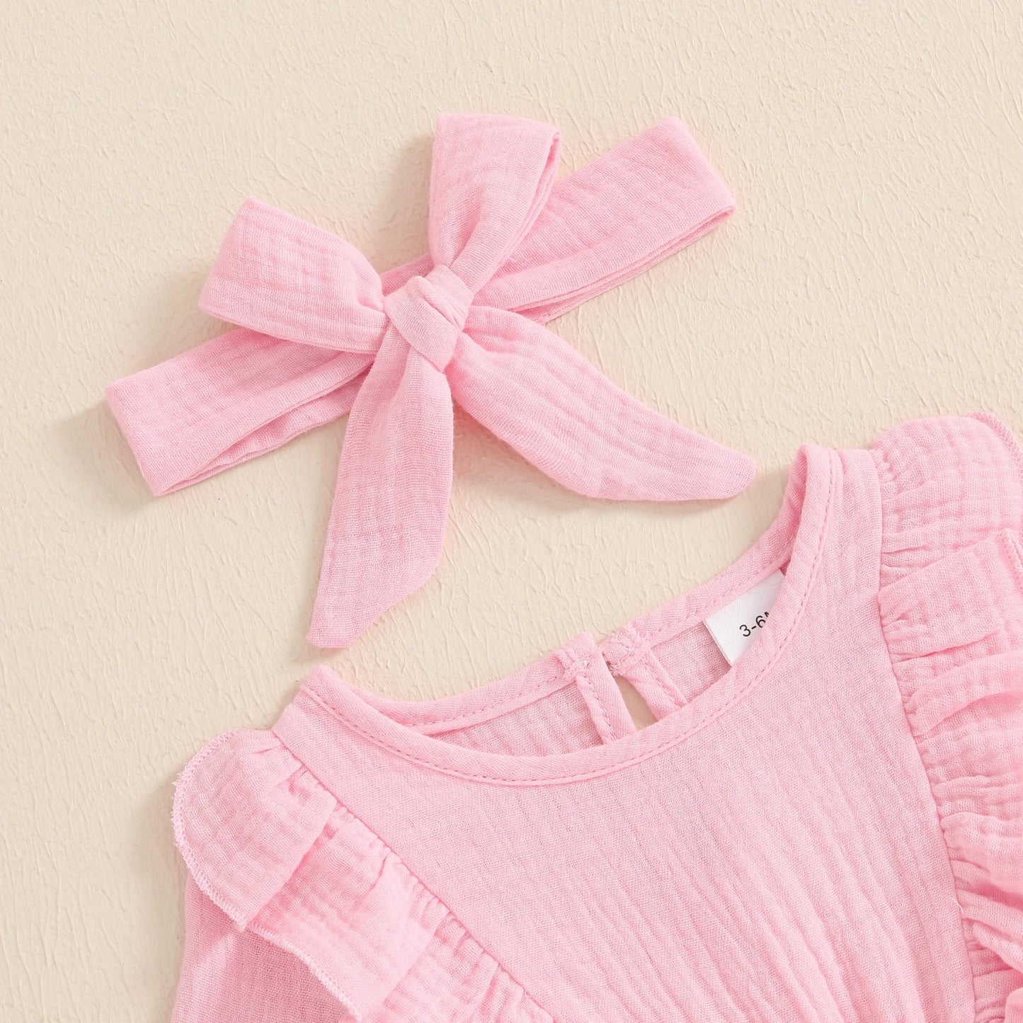 Bambino's Colorful Romper And Bow Set